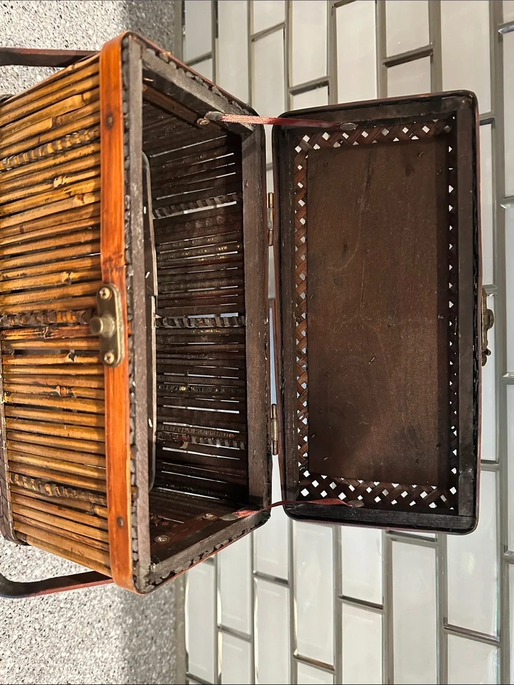 Woven bamboo storage box. All bamboo with metal latch closure.